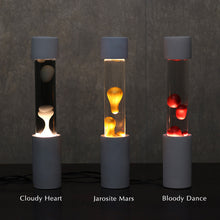 画像をギャラリービューアに読み込む, 点灯すると呼吸をするように流動的に形を変えながらコンクリートの筒を行き来する Dripping Lamp(ドリッピングランプ)