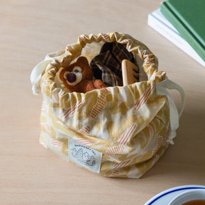 たっぷり収納 簡単に開け閉めできるポーチ WARMGREY TAIL の STRING POUCH