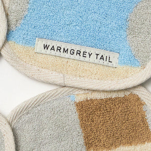 1つ1つデザインが異なる WARMGREY TAIL の TOWEL COASTER(タオルコースター)