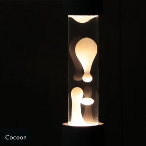 点灯すると呼吸をするように流動的に形を変えながらコンクリートの筒を行き来する Dripping Lamp（ドリッピングランプ）