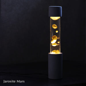 点灯すると呼吸をするように流動的に形を変えながらコンクリートの筒を行き来する Dripping Lamp（ドリッピングランプ）