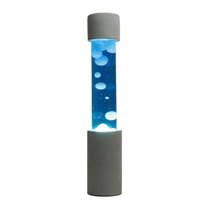 点灯すると呼吸をするように流動的に形を変えながらコンクリートの筒を行き来する Dripping Lamp（ドリッピングランプ）