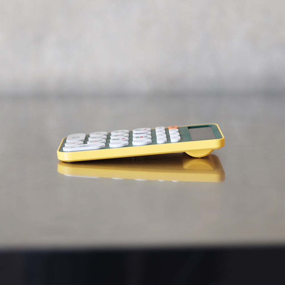 ピンズ マンズ デザインのボタンが特徴的な麻雀電卓 MAHJONG DENTAKU