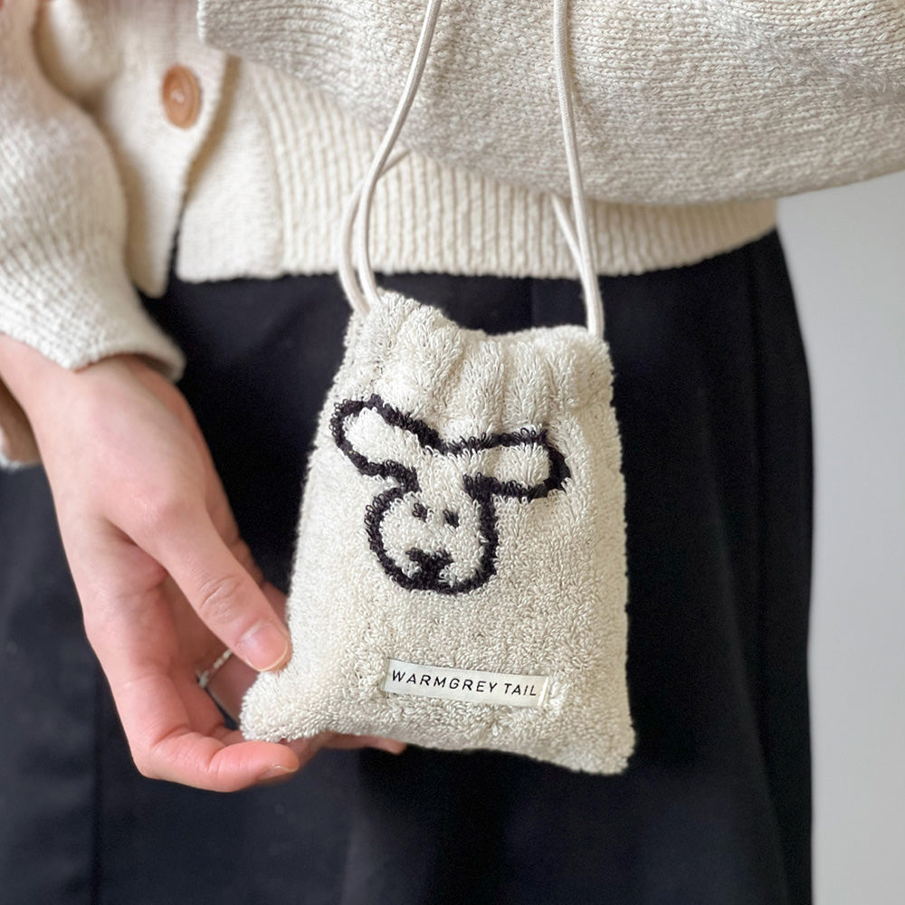 1つ1つデザインが異なるミニサイズの紐付きポーチ WARMGREY TAIL の TERRY POUCH（テリーポーチ）