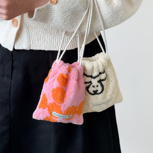 1つ1つデザインが異なるミニサイズの紐付きポーチ WARMGREY TAIL の TERRY POUCH（テリーポーチ）