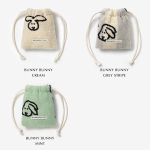 1つ1つデザインが異なるミニサイズの紐付きポーチ WARMGREY TAIL の TERRY POUCH（テリーポーチ）