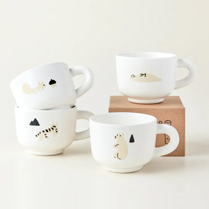 イラストと相性が良いフォルムのマグカップ WARMGREY TAIL の TUBE MILK CUP（チューブ ミルクカップ）
